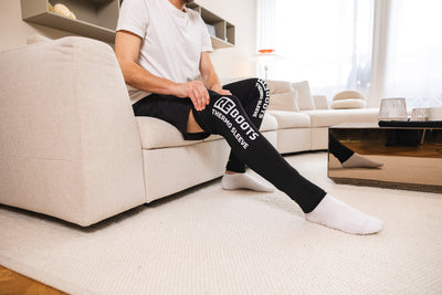 Hombre lleva Thermo Sleeve Full Leg